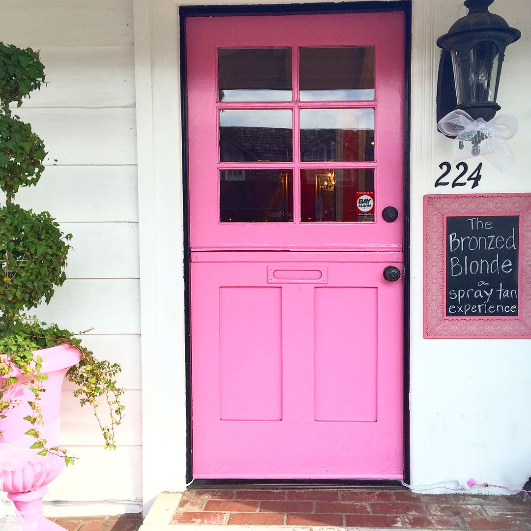 pink door and storefront